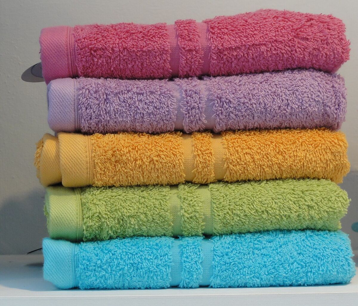 Dry Wet Clothes Fast with the Dry Towel Trick